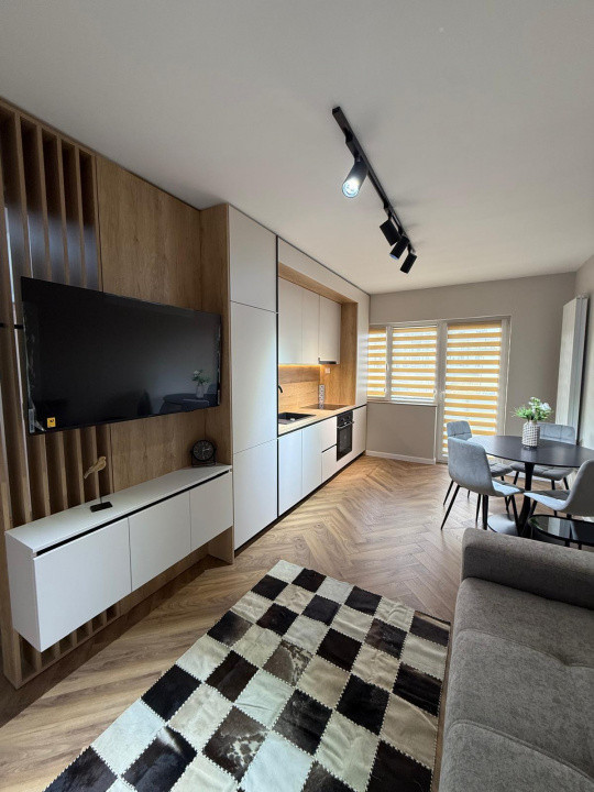 Apartament de 3 camere, bloc nou, parcare subterana, zona Terra