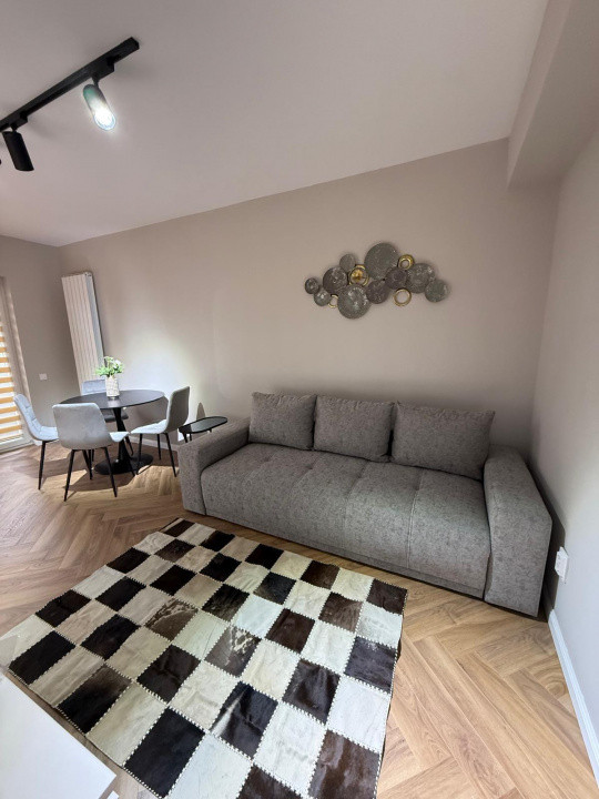 Apartament de 3 camere, bloc nou, parcare subterana, zona Terra