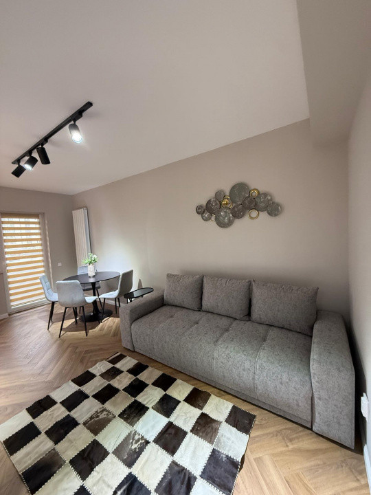 Apartament de 3 camere, bloc nou, parcare subterana, zona Terra