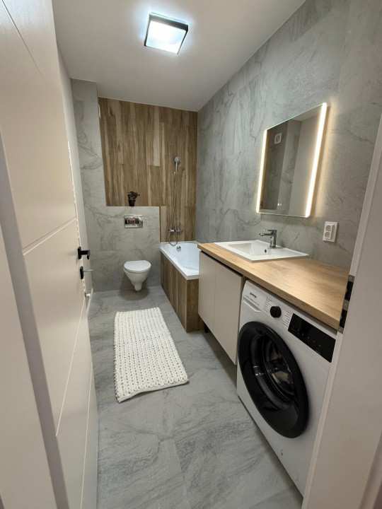 Apartament de 3 camere, bloc nou, parcare subterana, zona Terra