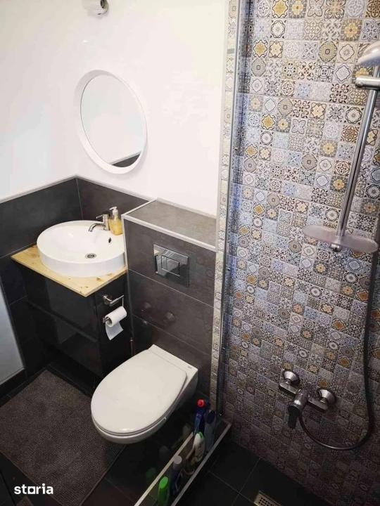 Apartament de 2 camere, gradina de 50 mp, parcare, zona Terra
